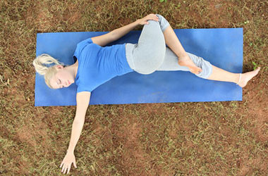 Natarajasan (Lying Down Body Twist) yoga pose