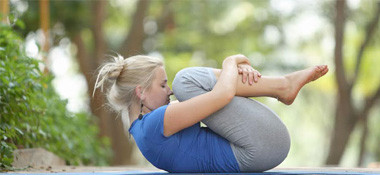 Pawanmuktasana (Wind relieving) Lying back Yoga pose
